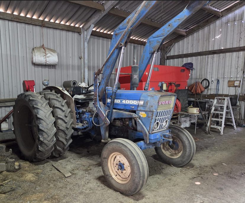 Blue Ford 4000 tractor with front loader